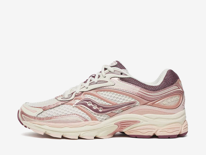 The Saucony ProGrid Omni 9 Ivory features a breathable mesh upper with layered cream and soft pink overlays, finished with deeper burgundy accents for added contrast. Underfoot, ProGrid cushioning and a chunky sole unit deliver comfort while maintaining the silhouette’s retro-running look.