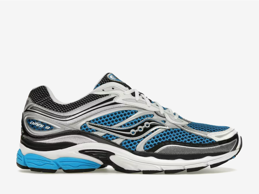 The Saucony Omni 9 “Royal Silver” blends running heritage with a clean, modern look. Breathable mesh is paired with metallic silver overlays and royal blue accents for a standout yet wearable finish. Supportive cushioning and a structured midsole provide all-day comfort and stability, making it ideal for both movement and everyday wear.