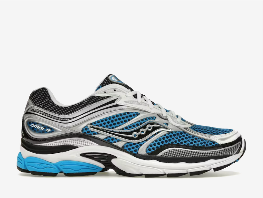 The Saucony Omni 9 “Royal Silver” blends running heritage with a clean, modern look. Breathable mesh is paired with metallic silver overlays and royal blue accents for a standout yet wearable finish. Supportive cushioning and a structured midsole provide all-day comfort and stability, making it ideal for both movement and everyday wear.