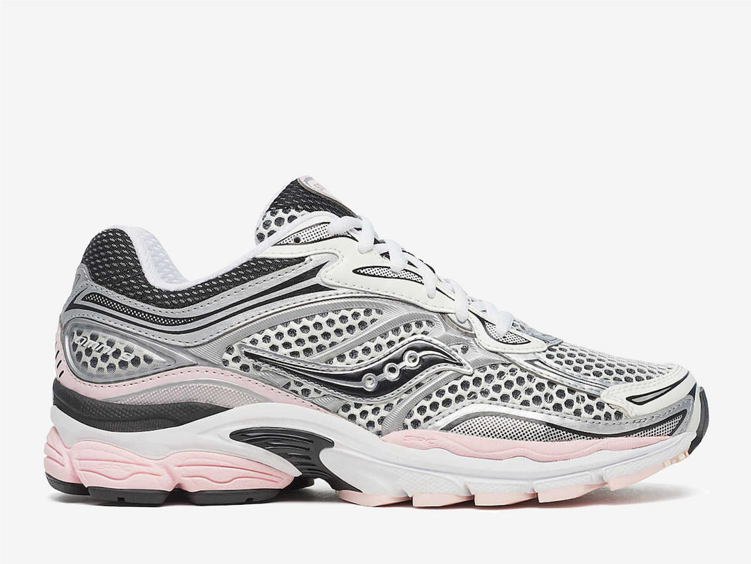 The Saucony ProGrid Omni 9 Silver Pink balances technical design with playful contrast by pairing metallic silver with soft pink accents. The result feels approachable yet expressive, letting the silhouette’s layered construction shine while color adds personality. It highlights the ProGrid Omni 9 as a bridge between archival running function and contemporary lifestyle appeal.