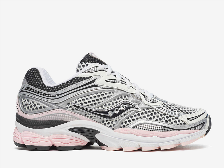 The Saucony ProGrid Omni 9 Silver Pink balances technical design with playful contrast by pairing metallic silver with soft pink accents. The result feels approachable yet expressive, letting the silhouette’s layered construction shine while color adds personality. It highlights the ProGrid Omni 9 as a bridge between archival running function and contemporary lifestyle appeal.
