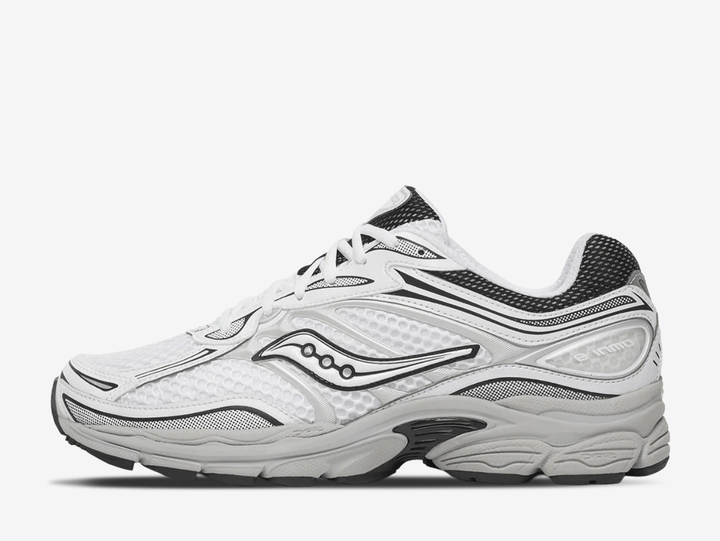 Saucony ProGrid Omni 9 trainers in the White Cadet colourway, featuring breathable white mesh uppers, metallic silver overlays, navy blue detailing, classic Saucony branding and a cushioned retro running sole.