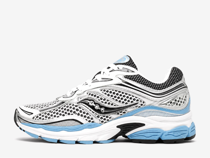 This colourway features a clean white mesh base paired with metallic silver overlays, black detailing, and soft blue accents throughout, creating a sharp Y2K runner aesthetic. Finished with classic Saucony branding and responsive cushioning underfoot, the Saucony ProGrid Omni 9 White Blue blends retro performance heritage with modern everyday styling.