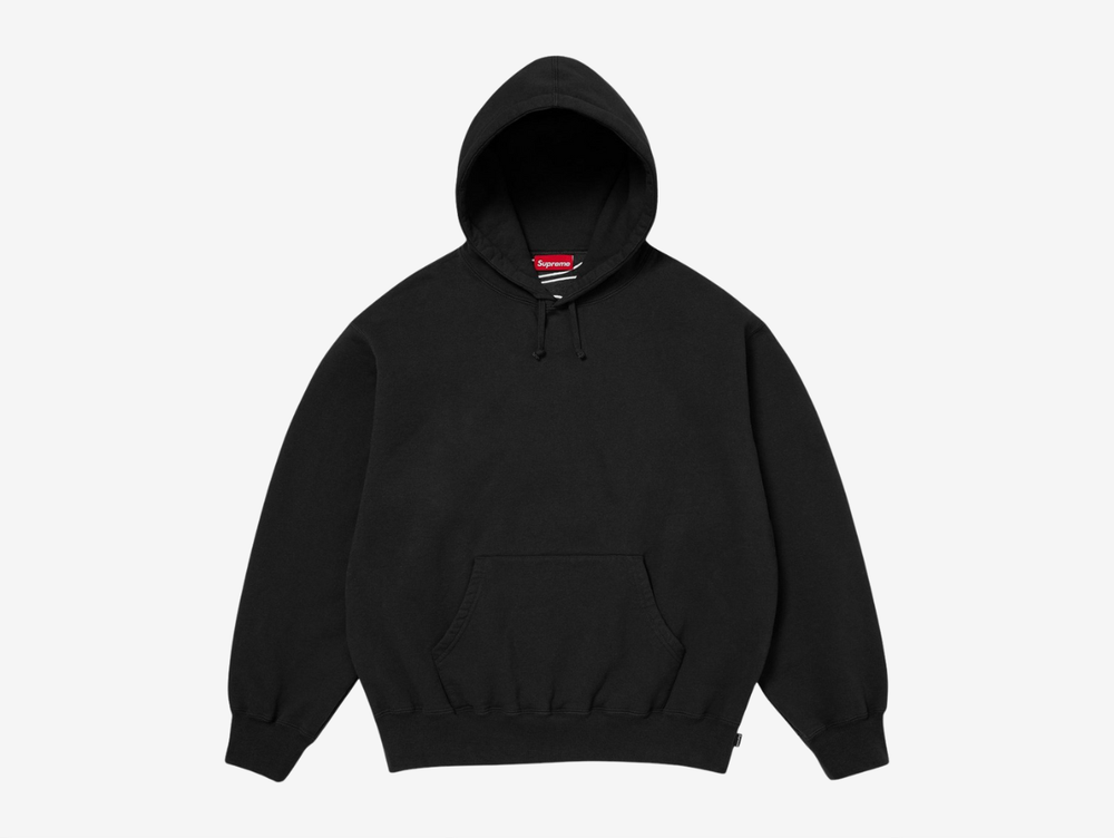 The Supreme Appliqué Logo Hoodie in Black delivers a polished take on a classic staple. Made from soft, heavyweight fleece, it features a bold appliqué Supreme logo across the chest that adds texture and strong visual presence. The roomy hood, kangaroo pocket, and ribbed details keep the fit secure and comfortable. The black colorway stays versatile and easy to pair with anything. This hoodie is a solid choice for anyone looking for reliable comfort with a standout Supreme touch.