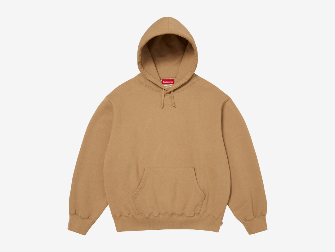 The Supreme Appliqué Logo Hoodie in Brown delivers a warm, earthy look with the same soft, heavyweight fleece for dependable comfort. The appliqué Supreme logo across the chest adds texture and clear visual focus without overpowering the design. A roomy hood, kangaroo pocket, and ribbed trims keep the fit secure and practical. The brown colorway brings depth and character, making this hoodie a strong choice for anyone who wants classic Supreme style with a richer tone.