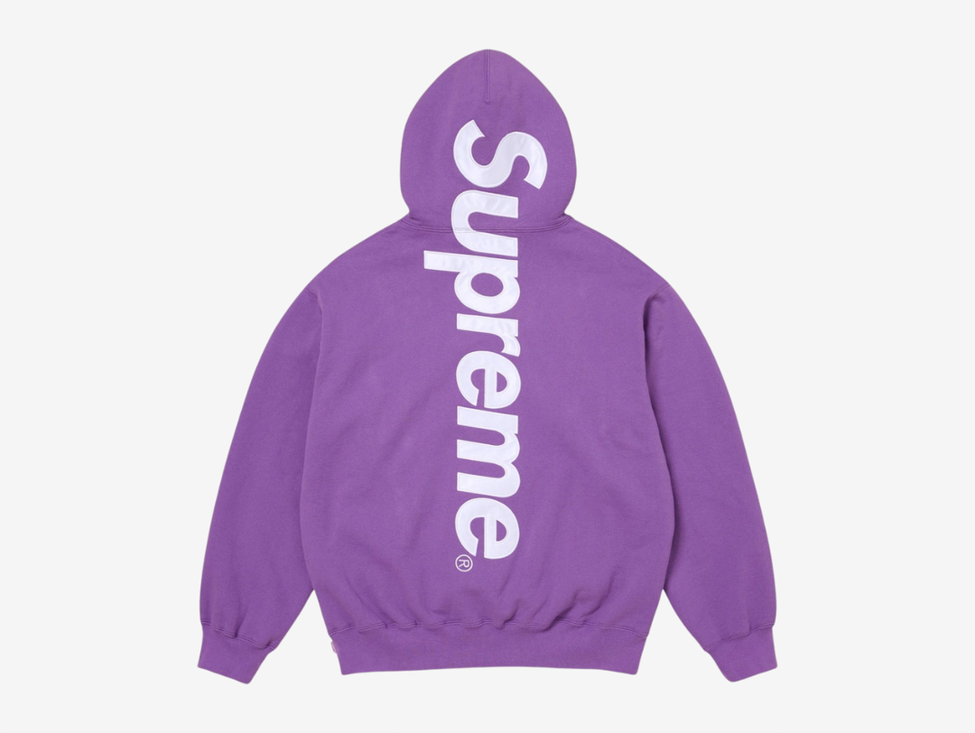 The Supreme Appliqué Logo Hoodie in Purple stands out with a bold, saturated color paired with soft, heavyweight fleece for steady comfort. The appliqué Supreme logo across the chest adds textured detail that complements the vibrant tone. The hood, kangaroo pocket, and ribbed trims keep the fit reliable and easy to wear. The purple colorway gives this piece a confident edge, ideal for anyone looking for a Supreme hoodie with strong personality.