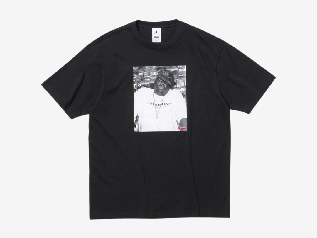 Crafted from soft, premium cotton, the Supreme x Jordan Biggie Tee 'Black' delivers both comfort and standout style. The relaxed fit makes it ideal for casual wear, whether styled with jeans or layered under a jacket. Elevate your streetwear collection with this exclusive piece that celebrates the timeless connection between sport, music, and fashion. Don’t miss your chance to own this unique design that merges hip-hop heritage with Jordan’s basketball legacy.