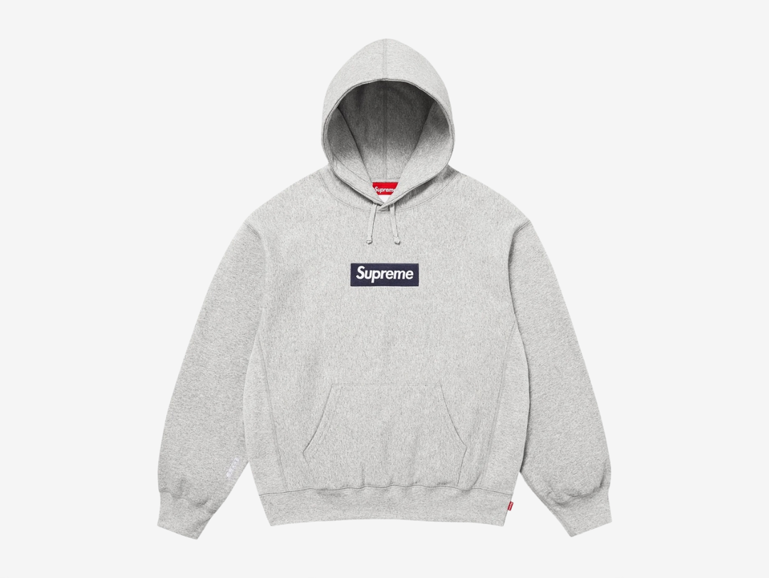 Made from heavyweight crossgrain brushed-back fleece, this Supreme Box Logo Hoodie offers superior warmth, structure, and durability with a soft interior feel. Ribbed gussets reinforce the design while allowing comfortable movement, and a classic pouch pocket adds everyday practicality. Finished with Supreme’s iconic embroidered box logo on the chest and an embroidered graphic on the sleeve, this hoodie delivers a clean, elevated take on a streetwear essential.