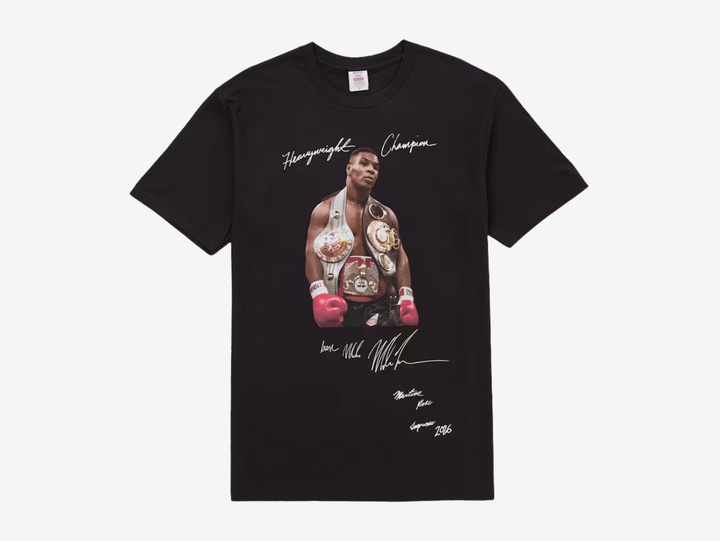 The Supreme Mike Tyson T-Shirt Black features the iconic photographic Mike Tyson graphic across the front of a classic black cotton tee. The dark base gives the legendary Supreme photo graphic a bold contrast, making it one of the brand’s most recognisable archive designs.