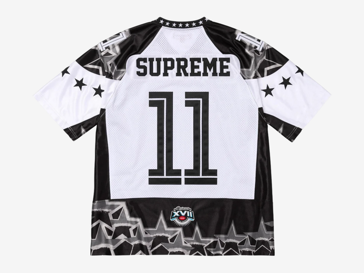 The Supreme Stars Football Jersey in Black and White delivers a clean athletic look with Supreme’s streetwear edge. Made from breathable, lightweight mesh, it features bold star detailing and contrast paneling that give it a classic jersey feel. The relaxed fit keeps it comfortable for daily wear while the sharp black and white colorway makes it easy to style. This piece works well for anyone who wants a sporty Supreme item with a strong visual presence.