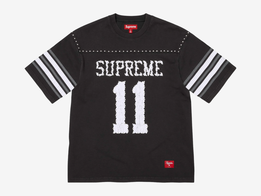 All cotton slub jersey crewneck with metal studs at yoke. Printed logo and graphic at front and back with rhinestone appliqué. Woven logo label at lower front.