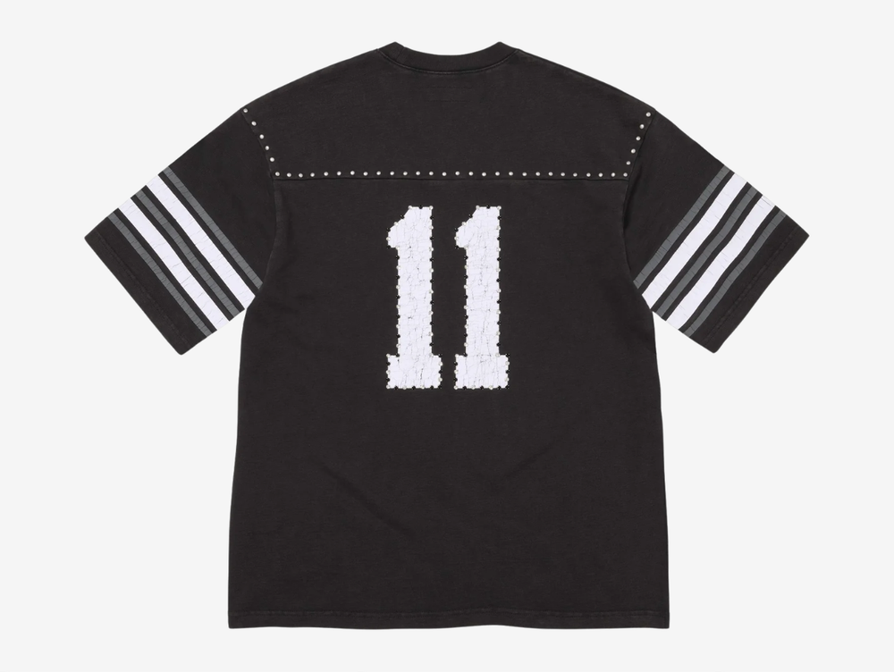 All cotton slub jersey crewneck with metal studs at yoke. Printed logo and graphic at front and back with rhinestone appliqué. Woven logo label at lower front.