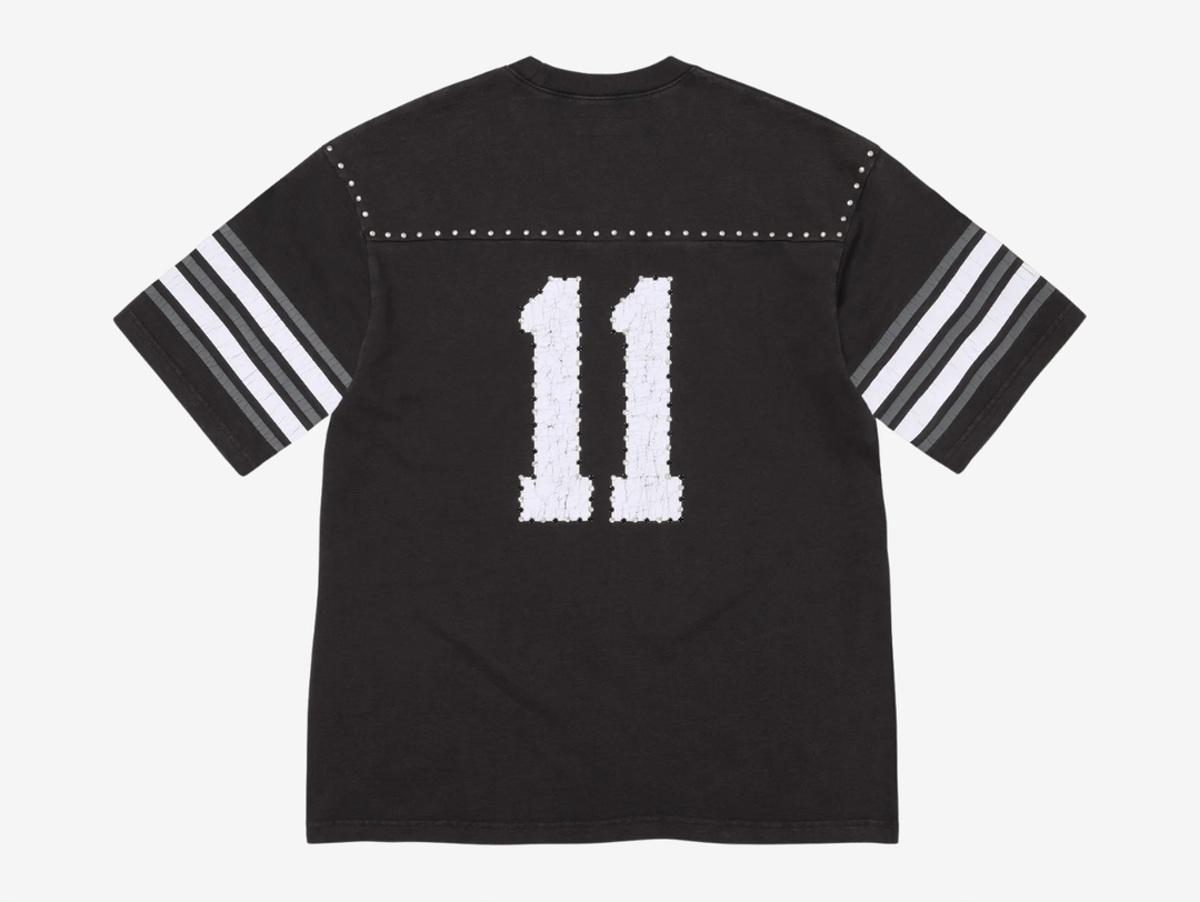 All cotton slub jersey crewneck with metal studs at yoke. Printed logo and graphic at front and back with rhinestone appliqué. Woven logo label at lower front.