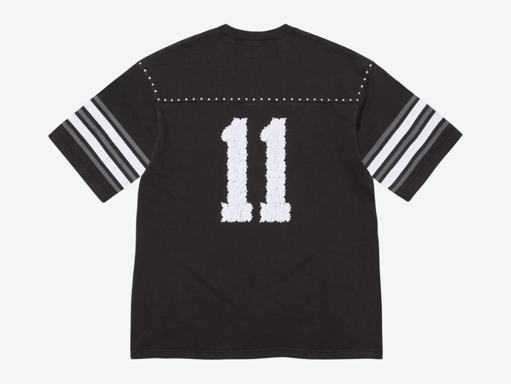 All cotton slub jersey crewneck with metal studs at yoke. Printed logo and graphic at front and back with rhinestone appliqué. Woven logo label at lower front.