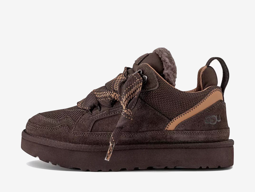 The UGG Lowmel Dusted Cocoa features a warm brown finish across its layered suede and textile upper. The relaxed, chunky silhouette combines casual styling with soft cushioning and signature UGG comfort.