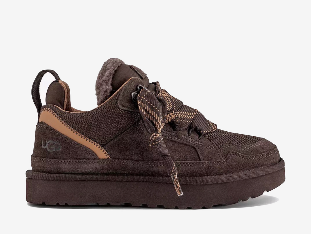 The UGG Lowmel Dusted Cocoa features a warm brown finish across its layered suede and textile upper. The relaxed, chunky silhouette combines casual styling with soft cushioning and signature UGG comfort.