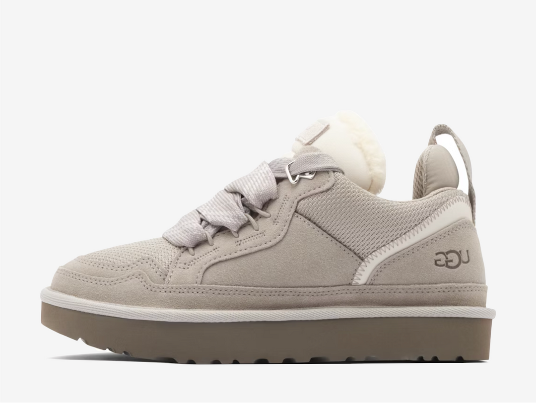 This versatile silhouette features a chunky, sustainable build in light grey recycled ballistic canvas mesh with premium suede. Thick two-tone laces nod to early 2000s skate shoes, while a polyester mesh lining and inner heel pillow enhance breathability and comfort. The UGGplush tongue and sockliner add softness from the start, set atop an elevated sugarcane EVA outsole for a bold finish.