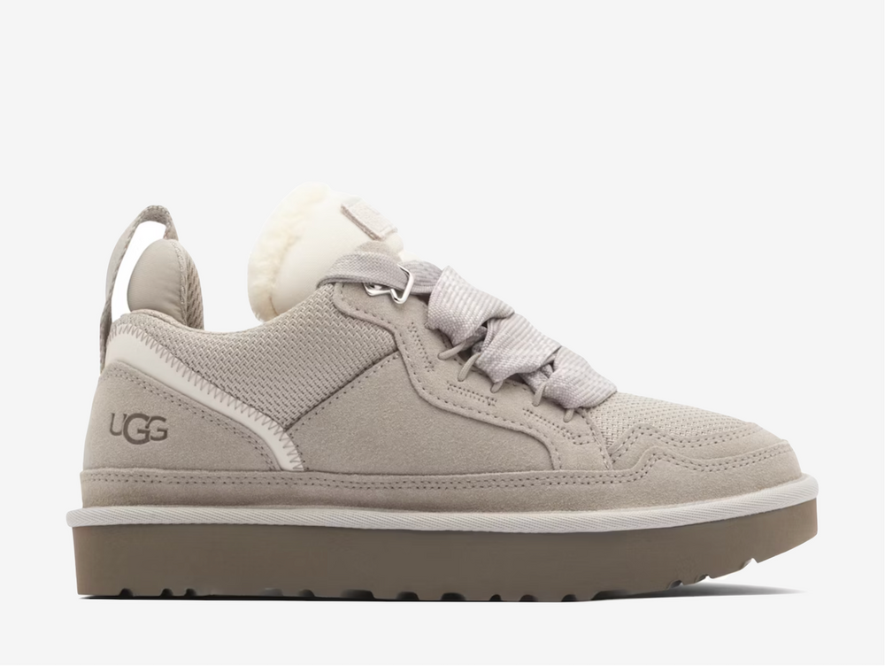 This versatile silhouette features a chunky, sustainable build in light grey recycled ballistic canvas mesh with premium suede. Thick two-tone laces nod to early 2000s skate shoes, while a polyester mesh lining and inner heel pillow enhance breathability and comfort. The UGGplush tongue and sockliner add softness from the start, set atop an elevated sugarcane EVA outsole for a bold finish.
