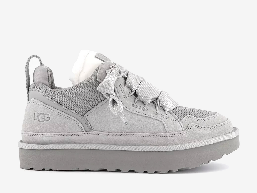 The newest edition of the UGG Lowmel in Seal Grey, exclusive just to OFFICE, blends West Coast cool with eco-conscious design. Crafted from soft suede and recycled canvas mesh, this sneaker-boot hybrid features chunky laces, plush UGGplush™ lining, and a sugarcane EVA outsole for all-day comfort. Perfect for styling with relaxed cargos or oversized knits, it’s a laid-back essential with elevated edge.