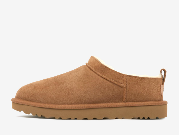 The plush sheepskin lining cocoons feet in their own personal atmosphere, naturally regulating temperature for comfort that never overheats. This isn't just a boot. It's a statement. Perfect for pairing with cuffed denim or relaxed loungewear, the Classic Micro Chestnut whispers luxury while shouting comfort, transitioning effortlessly between indoor sanctuary and street-ready style.