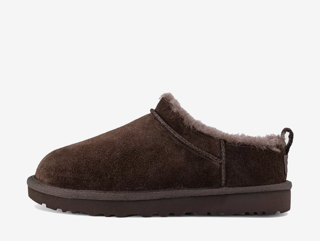 The UGG Classic Micro Boot Dusted Cocoa features the familiar UGG shape in a shortened, easy-to-wear silhouette. A rich brown suede upper is paired with a soft plush lining and lightweight sole for signature warmth and comfort.