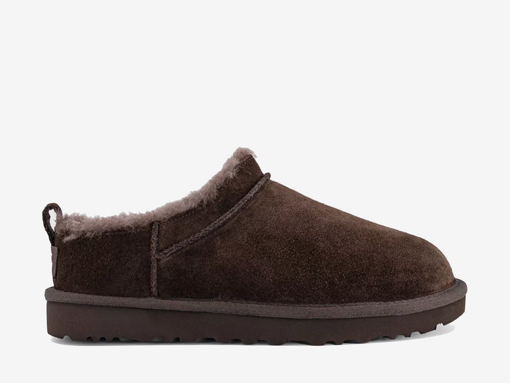 The UGG Classic Micro Boot Dusted Cocoa features the familiar UGG shape in a shortened, easy-to-wear silhouette. A rich brown suede upper is paired with a soft plush lining and lightweight sole for signature warmth and comfort.