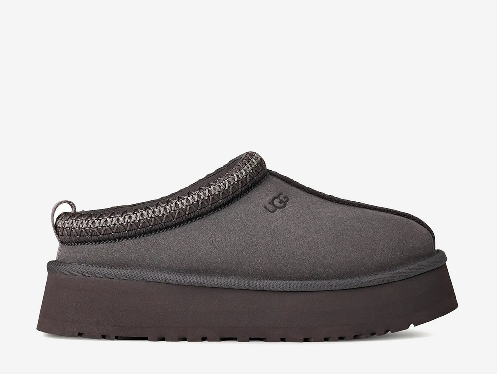 A fresh take on a favorite, the Tazz II features smooth suede, plush sheepskin lining, and a lightweight sugarcane EVA sole with an enhanced rocker shape. Finished with signature UGGbraid detailing, it delivers effortless comfort and style with every step.