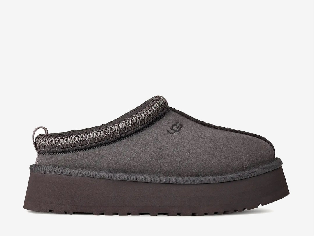 A fresh take on a favorite, the Tazz II features smooth suede, plush sheepskin lining, and a lightweight sugarcane EVA sole with an enhanced rocker shape. Finished with signature UGGbraid detailing, it delivers effortless comfort and style with every step.