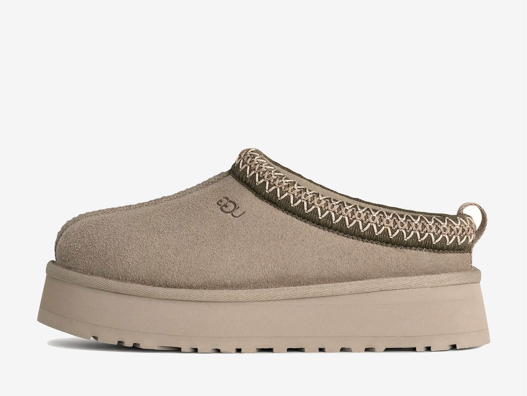 A fresh take on a favorite, the Tazz II features smooth suede, plush sheepskin lining, and a lightweight sugarcane EVA sole with an enhanced rocker shape. Finished with signature UGGbraid detailing, it delivers effortless comfort and style with every step.
