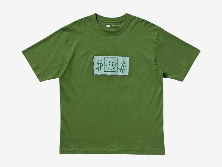 The Uniqlo x CPFM Spongebob Squarepants UT Graphic T Shirt Olive blends muted earth tone with animated vibrancy. The olive base adds subtle depth, while CPFM’s Spongebob graphic introduces bold contrast across the chest. Its classic tee construction ensures comfort and everyday wearability. The combination feels balanced and expressive.