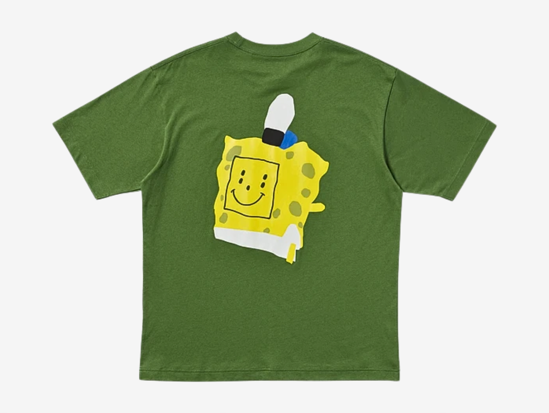 The Uniqlo x CPFM Spongebob Squarepants UT Graphic T Shirt Olive blends muted earth tone with animated vibrancy. The olive base adds subtle depth, while CPFM’s Spongebob graphic introduces bold contrast across the chest. Its classic tee construction ensures comfort and everyday wearability. The combination feels balanced and expressive.