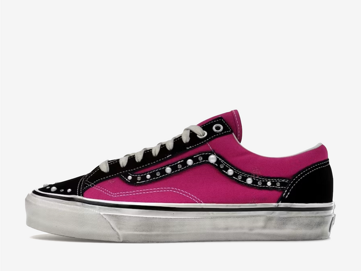 Vans OTW Old Skool 36 Pearlized Pack Pink Black takes the foundational Vans Old Skool silhouette and turns it into a celebration of texture and contrast, pairing a pearlized pink finish with classic black elements for a look that feels bold yet refined. The Old Skool’s iconic side stripe and low top profile provide a familiar canvas, while the pearlized detail gives it an elevated feel that appeals to both skate and lifestyle fans.