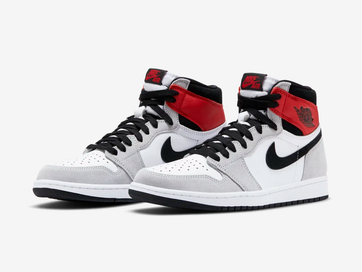 Classic Jordan 1 High shoes with red, white, and grey colourway.