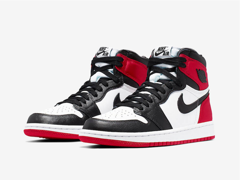 Classic Jordan 1 High Chicago shoes with red, white, and black colorway.