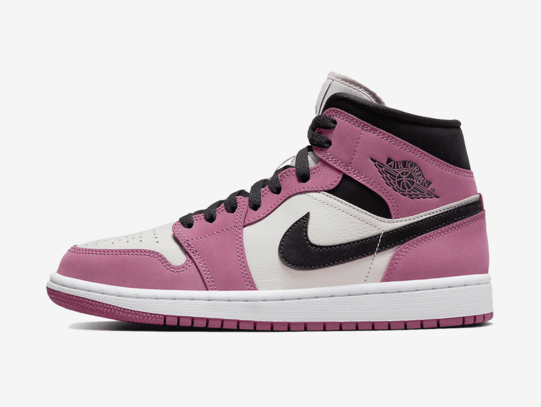 Classic Jordan 1 Mid shoes with a pink, white, and black colourway.