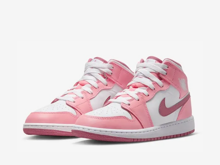 Exclusive Jordan 1 Mid shoes with a unique pink and white colour scheme.
