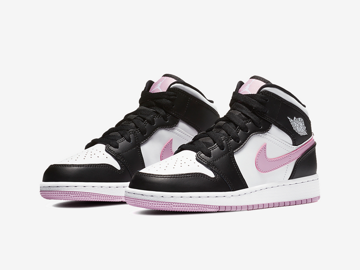 Timeless Air Jordan 1 Mid sneakers in a classic white, pink and black colour scheme.