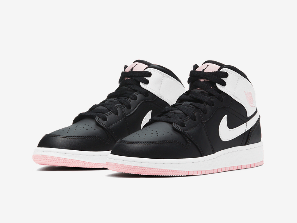 Exclusive Jordan 1 Mid shoes with a unique pink and black colour scheme.