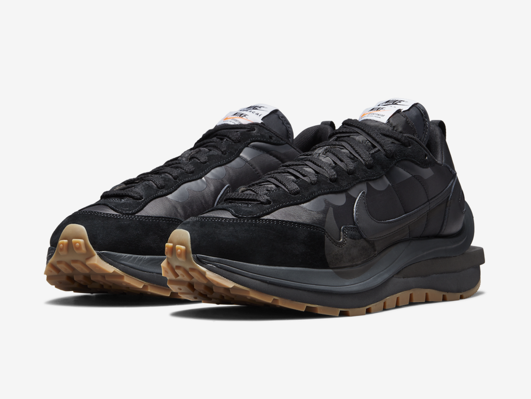 Classic Nike shoes with an all black colourway.