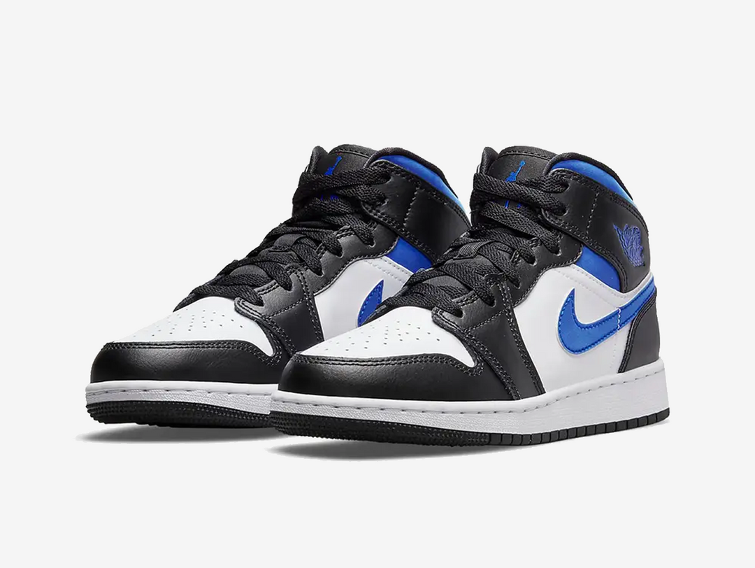 Classic Jordan 1 Mid shoes with a blue, white, and black colourway.