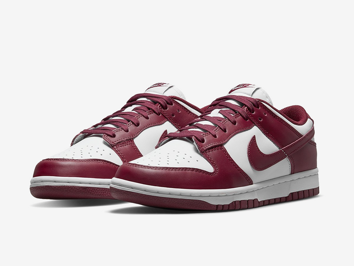 Classic Nike Dunk shoes with a white and maroon colourway.