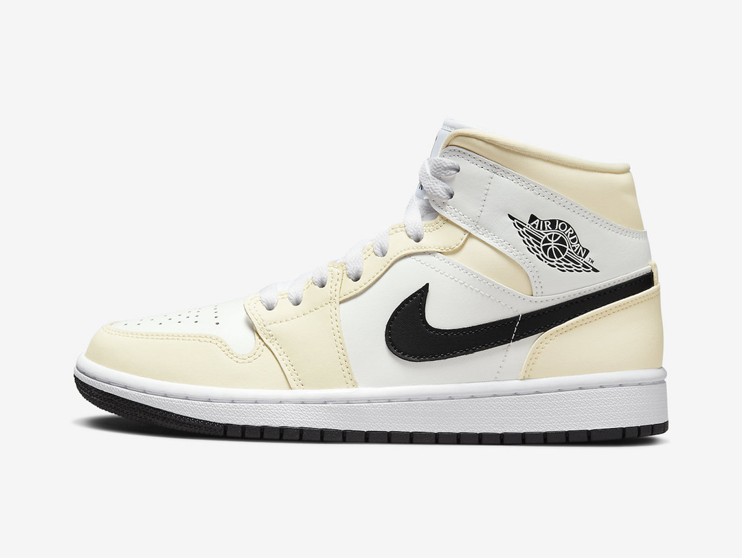 Exclusive Jordan 1 Mid shoes with a unique white and yellow colour scheme.