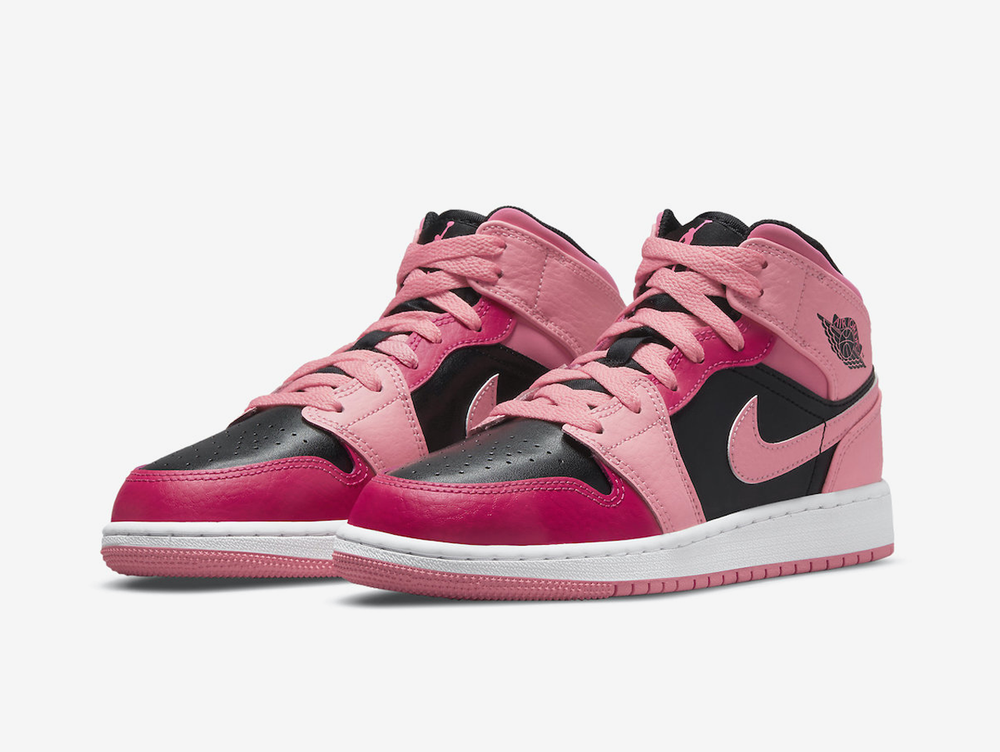 Exclusive Jordan 1 Mid shoes with a unique pink and black colour scheme.