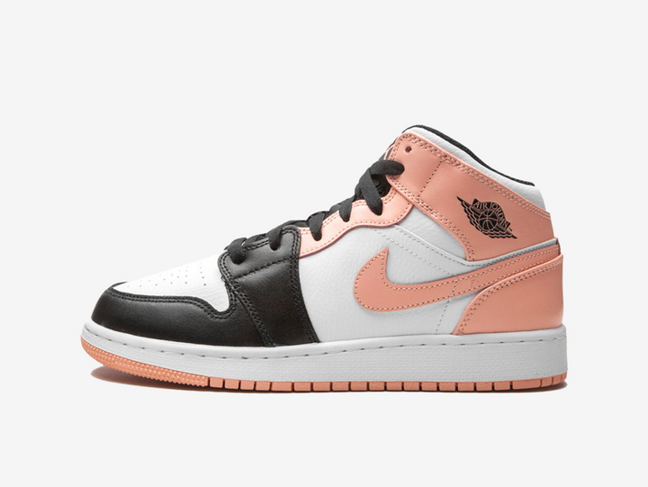 Classic Jordan 1 Mid shoes with a orange, white, and black colourway.