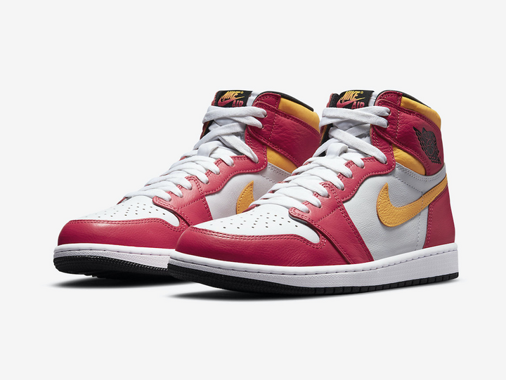 Classic Jordan 1 High shoes with red, white, and yellow colourway.