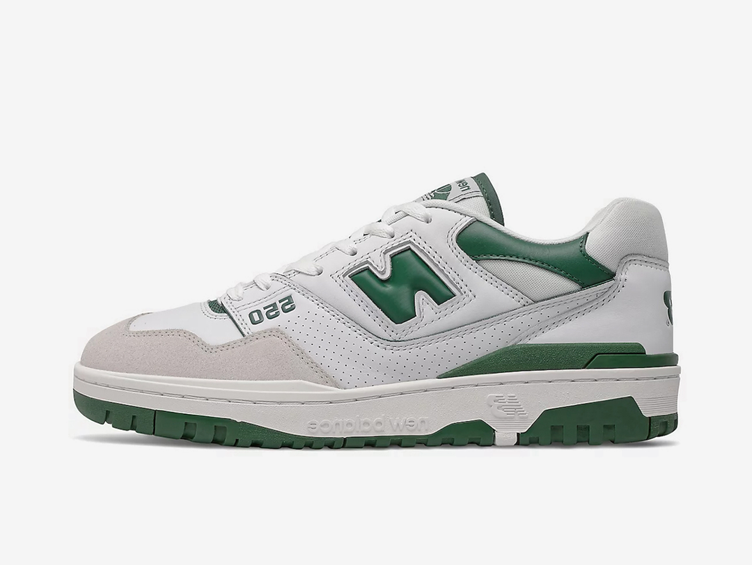 Classic New Balance shoes with a white and green colourway.