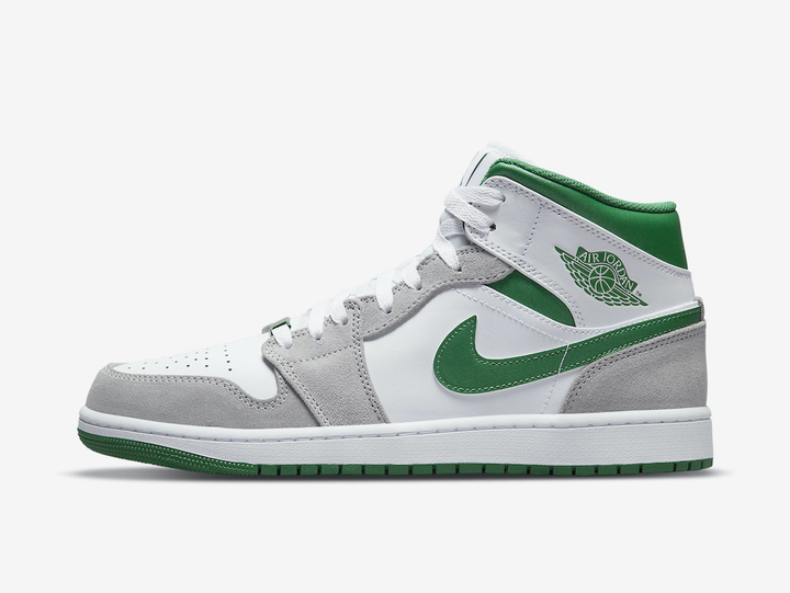 Classic Jordan 1 Mid shoes with a white and green colourway.