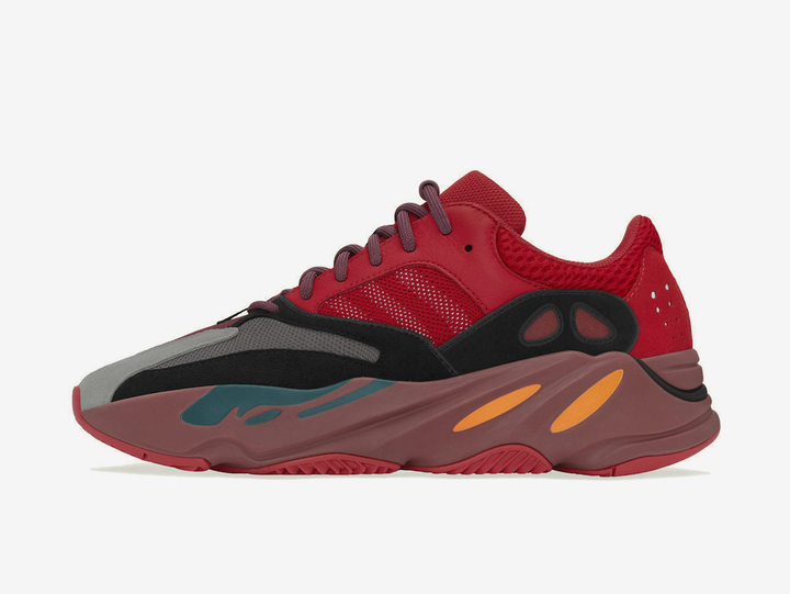 Exclusive Yeezy shoes with a unique red colour scheme.