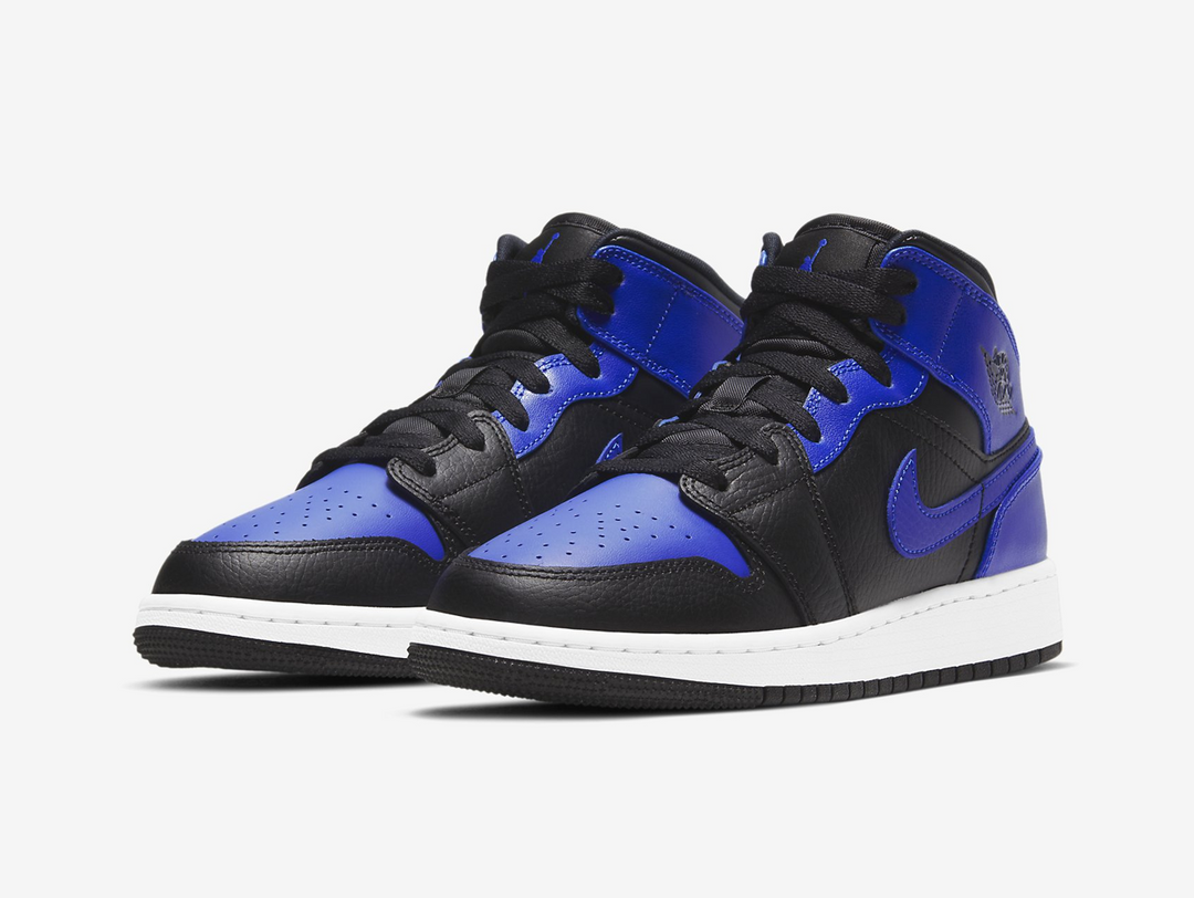 Timeless Air Jordan 1 Mid sneakers in a classic blue and black colour scheme.
