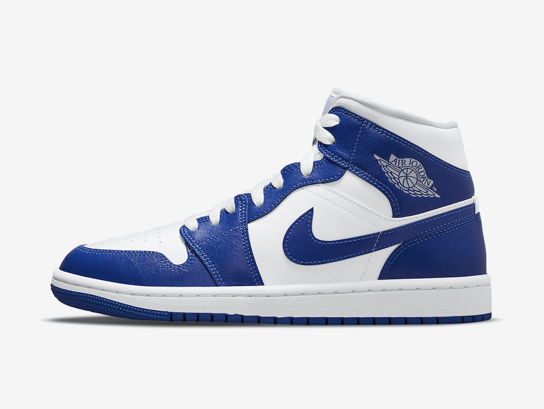 Timeless Air Jordan 1 Mid sneakers in a classic blue and white colour scheme.